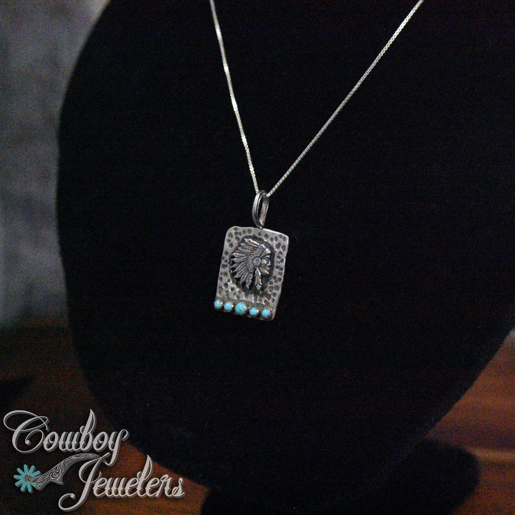 210 - Hand carved Indian head pendant