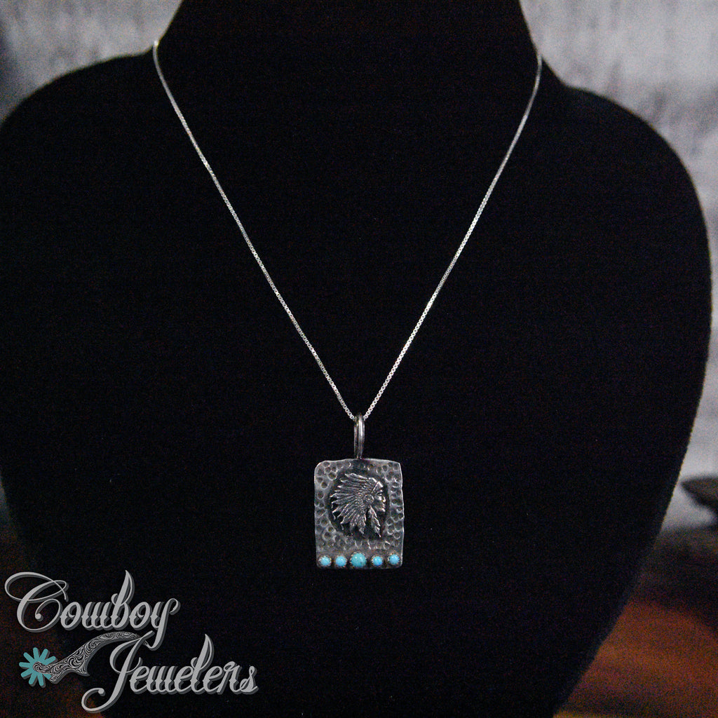 210 - Hand carved Indian head pendant