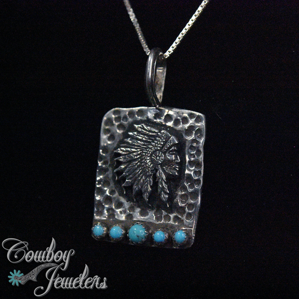 210 - Hand carved Indian head pendant