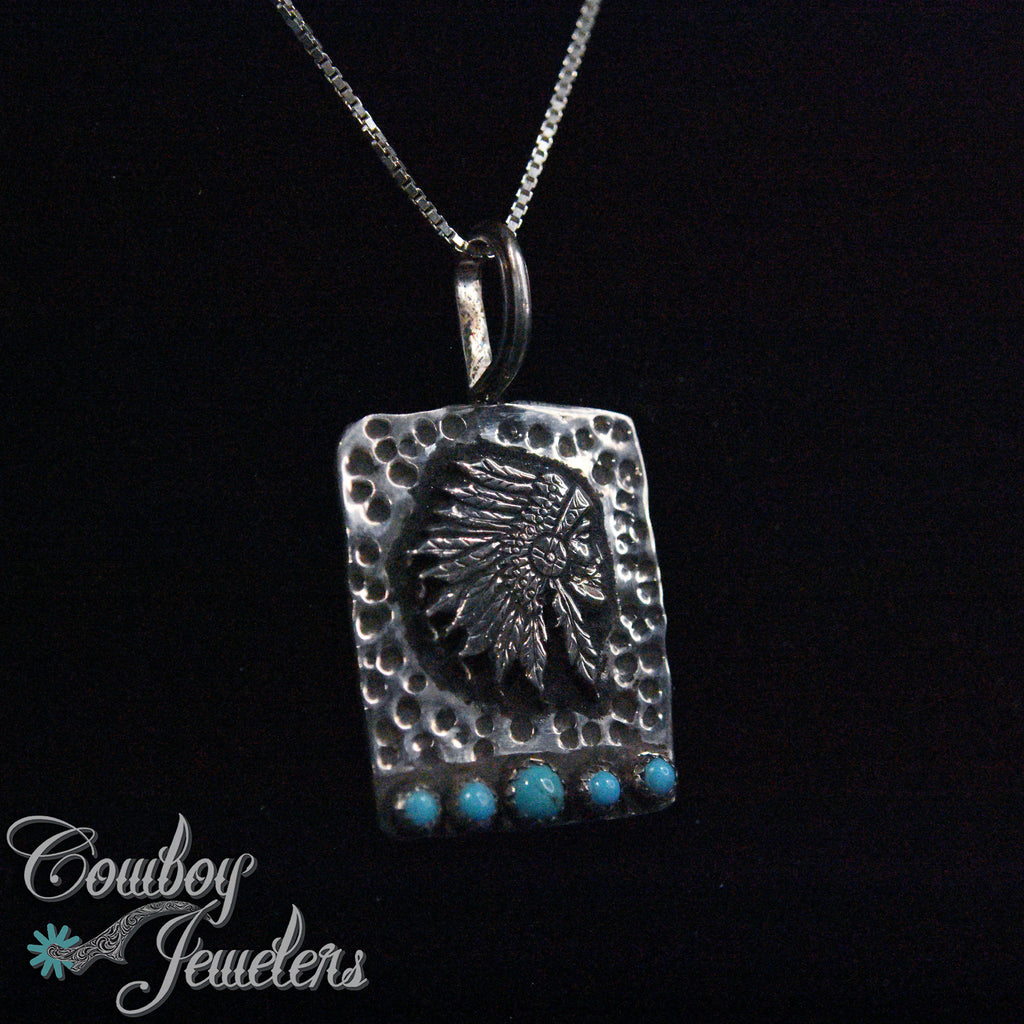 210 - Hand carved Indian head pendant